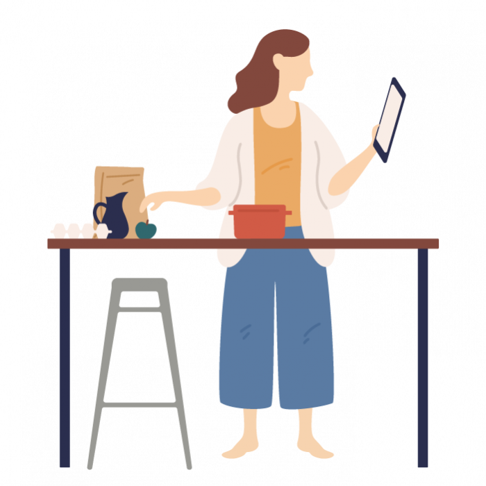 Illustration of a woman stood up at a kitchen table, reading her tablet whilst preparing food