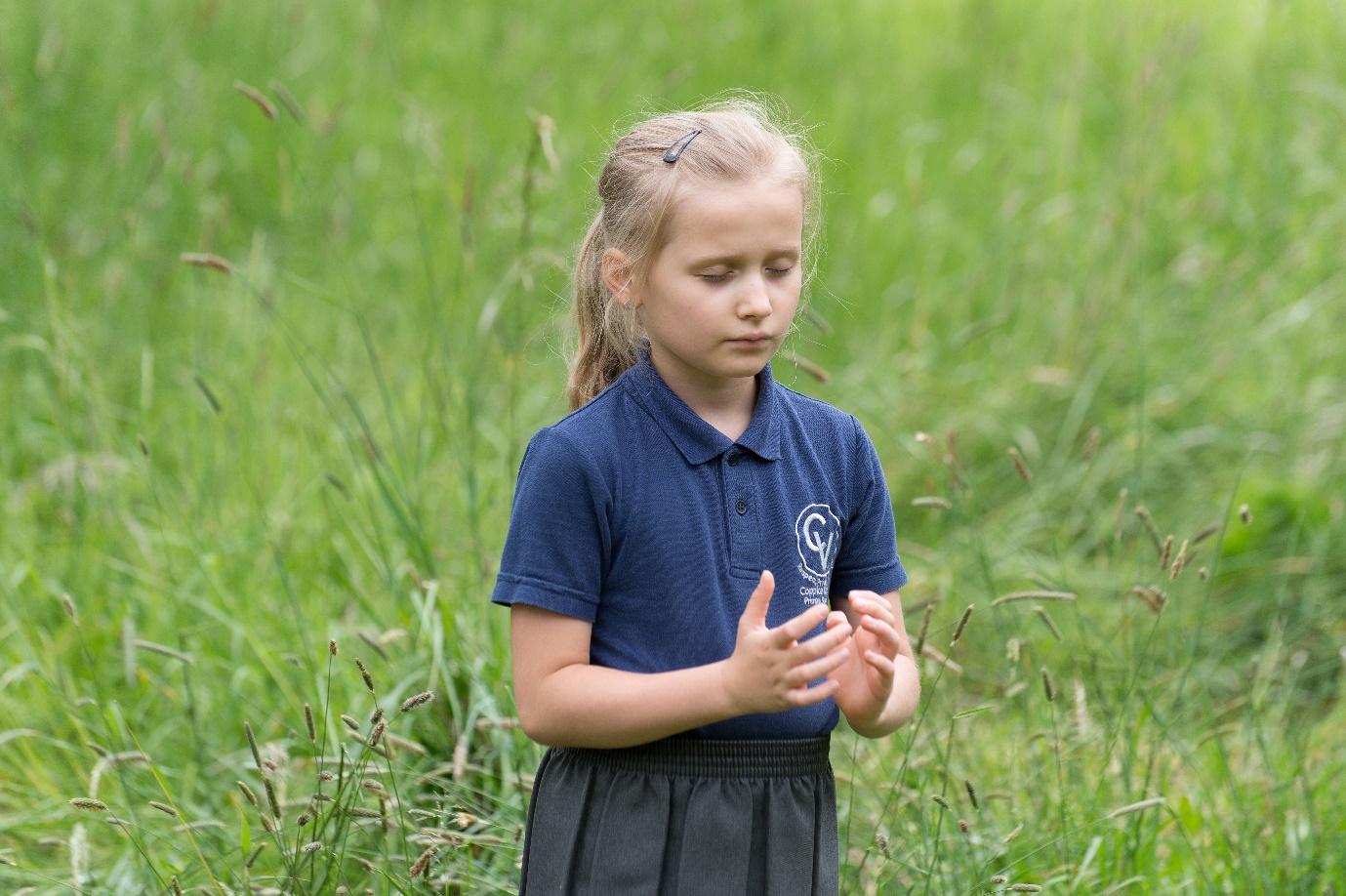 Image of young girl meditating